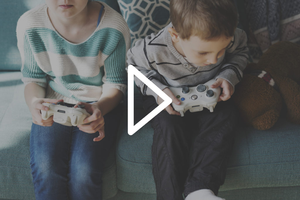 kids playing on consoles