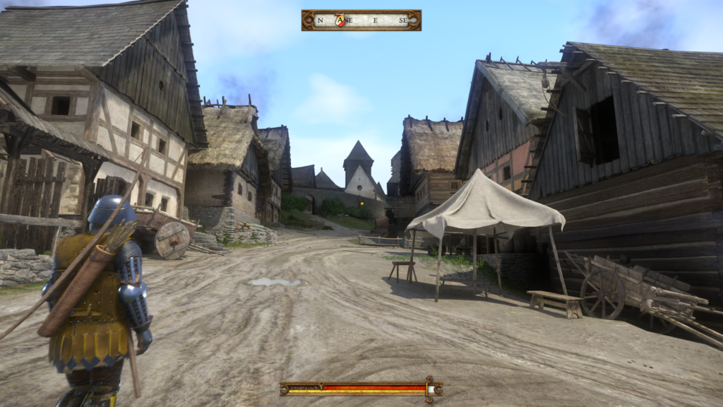  Walking through a town in Kingdom Come: Deliverance available on Xbox Game Pass